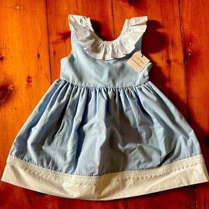 Catherine Malandrino denim girls size 4 dress with white trim and bow.